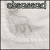 Static icon with a light gray deer silhouette on a white fabric background, text "obsessed" above the deer, and a red dot on the 's' in "obsessed".