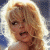 A pixelated contact sheet showing two frames of an animated icon featuring a blonde woman on the left and green text reading "Original Icons .com" on the right against a dark background.