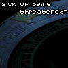 nine showing a blue-skinned alien head against a dark background with stone arches, text overlays, and a central 'Answer' message