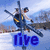 A pixelated image of two people in a boat on water with a mountainous background, displaying the word 'live' in blue text.