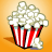 Pixelated image of a red and white striped container overflowing with white popcorn against an orange background.