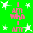 Green background with white stars and pink text reading "I AM WHO I AM" arranged in vertical