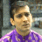 A pixelated image shows a person in a purple patterned shirt on the left, with green text reading "Original Icons .com" on a dark background to the right.