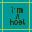 Two identical pixelated teal squares with yellow borders display the text "i'm a hoe!" in dark brown block letters