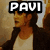 Pixelated image of a person with long dark hair wearing a dark jacket over a light shirt, with text overlays reading "PAVI" and "LARGO" in different frames.