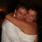 Two people embrace in a dimly lit setting with text reading "Rest In Peace Scott" and date "11/16/07" visible.