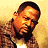 A 48x48 pixel buddy icon split into two vertical sections: a pixelated portrait of a man on the left and green text reading "Original Icons .com" on a dark green background on the right.