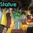 Animated scene with yellow pillars, green and brown elements, and text overlays changing from 'Statue' to 'of' to 'Mery'