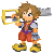 Pixel art character with brown hair, red shorts, yellow shoes, and a large key-shaped weapon held over the shoulder.