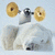 A polar bear lifts a barbell with golden weights against a light blue background, with text appearing in two separate frames.