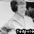 Black-and-white pixelated image of a person in motion with partial text overlays reading 'Tadpole', 'ard', and 'Fist!' across different frames.