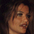 A 50x50 pixel animated buddy icon featuring a side-profile of a woman with brown hair on the left and green text reading "Original Icons .com" on a dark green background on the right, displayed as a contact sheet with two frames.