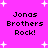 Pixelated text 'Jonas Brothers Rock!' repeated four times on a bright pink background with white starbursts, animated to shift positions.