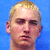 A 50x50 pixel AIM buddy icon featuring a celebrity mugshot-style portrait with green text overlays on a blue background, part of an animated contact sheet.