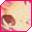 Pixelated image of a person's face with brown hair and eyes, framed by pink border on left side.