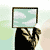 A 2x2 contact sheet of four animated frames showing a pixelated character with a monitor for a head and text fragments, arranged in a grid layout.