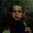 A child in a dark top with green and red accents appears across three , showing subtle facial expression changes against a textured background