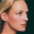 Pixelated profile of a person with light hair against dark background, adjacent to green text reading Original Icons .com in bright green pixel font.
