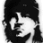 Black-and-white pixelated image of a person with dark hair and beard on left, red text "01.25.08" and black text "RAMBO" on right against white background.