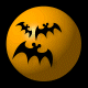Four yellow spheres with black bat symbols in various positions against a black background.
