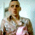 Static image of a person in light-colored shirt with green text 'Original Icons .com' on dark background.