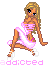 Pixelated cartoon woman in pink dress with white accents, seated pose on gray background, text 'addicted' below.