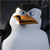 Pixelated close-up of a penguin's face with white and black plumage, blue eyes, and an orange beak against a dark background.