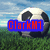 Pixelated soccer ball on grass field with blue sky background, overlaid with red text "ClarkM1" on blue rectangle in left view and red rectangle in right view.
