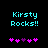 Pixelated cyan text "Kirsty Rocks!!" above a of five pink and purple heart icons on a black background
