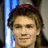 Pixelated image of a person with light brown hair and a maroon headband, next to purple text reading "One Tree Hill is so aweSome" on black background.
