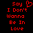 Red pixelated text on black background reads "Say I Don't Wanna Be In Love" with a heart symbol replacing the 'o' in "Say" on the left side.