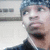 A person wearing a dark beanie and jacket appears in four with slight variations in head position and background details