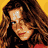 A 48x48 pixel animated contact sheet showing a woman in red clothing with visible midriff and blue-and-white bikini bottom, set against yellow background with Coolbuddy.com text on orange panel.