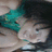 A person with dark hair and a teal top appears in three showing slight head movement