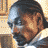 A 4-frame contact sheet of a pixelated animated icon featuring Snoop Dogg in various poses with text "Coolbuddy.com" on the right frame.