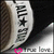 Static pixelated icon featuring vertical text on a light background with dark and pink accents, including a small heart symbol.