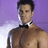 A shirtless man with a bow tie and choker stands against a purple background, while the lower-left corner displays 'Perfection' text on black.