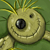 Pixelated character with large round head, single central eye, small side eye, and wide smile on green background.