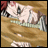 A pixelated character with light skin and dark eyes lies on a brown surface, wearing a white top with green stripes.