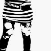 Black-and-white striped pants with circular knee patches, a white foot, and a pixelated figure with a striped top and dark lower body.