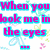Pixelated text in cyan and magenta with floral patterns on a white background, featuring the phrase "When you look me in a glimpse the eyes of Heaven... I find my paradise <33".