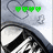 A static image shows a metallic object with a heart outline and green text or symbols above it.