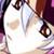 Pixelated anime-style icon of a girl with large eyes and brown hair, wearing a white top against a blurred background.