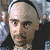 A 50x50 pixel buddy icon featuring a split composition with a character on the left and green text on the right, displayed as part of an animated contact sheet.