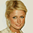 Pixelated image of a blonde woman with styled hair and light clothing, accompanied by four blocks of white text on black backgrounds.