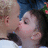 A pixelated image shows two people kissing on the left, with a magenta background and white text reading "I Love You." on the right.