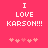Pixelated text on a solid pink background with animated heart symbols below.