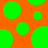 Green circular shapes of varying sizes scattered across an orange background with one shape having a small notch on its right edge.