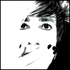 Black-and-white stylized portrait of a person with short dark hair, hand near mouth, multiple display text variations including 'J', 'A', 'D', 'E', 'JADE' vertically and horizontally