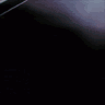 Animated sequence showing a hand gripping and manipulating a silver handgun against a dark background.